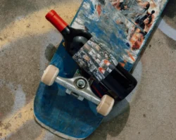 Killer Drop bottle on skateboard